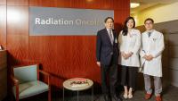 Faculty and Residents stand in front of a CRR sign.